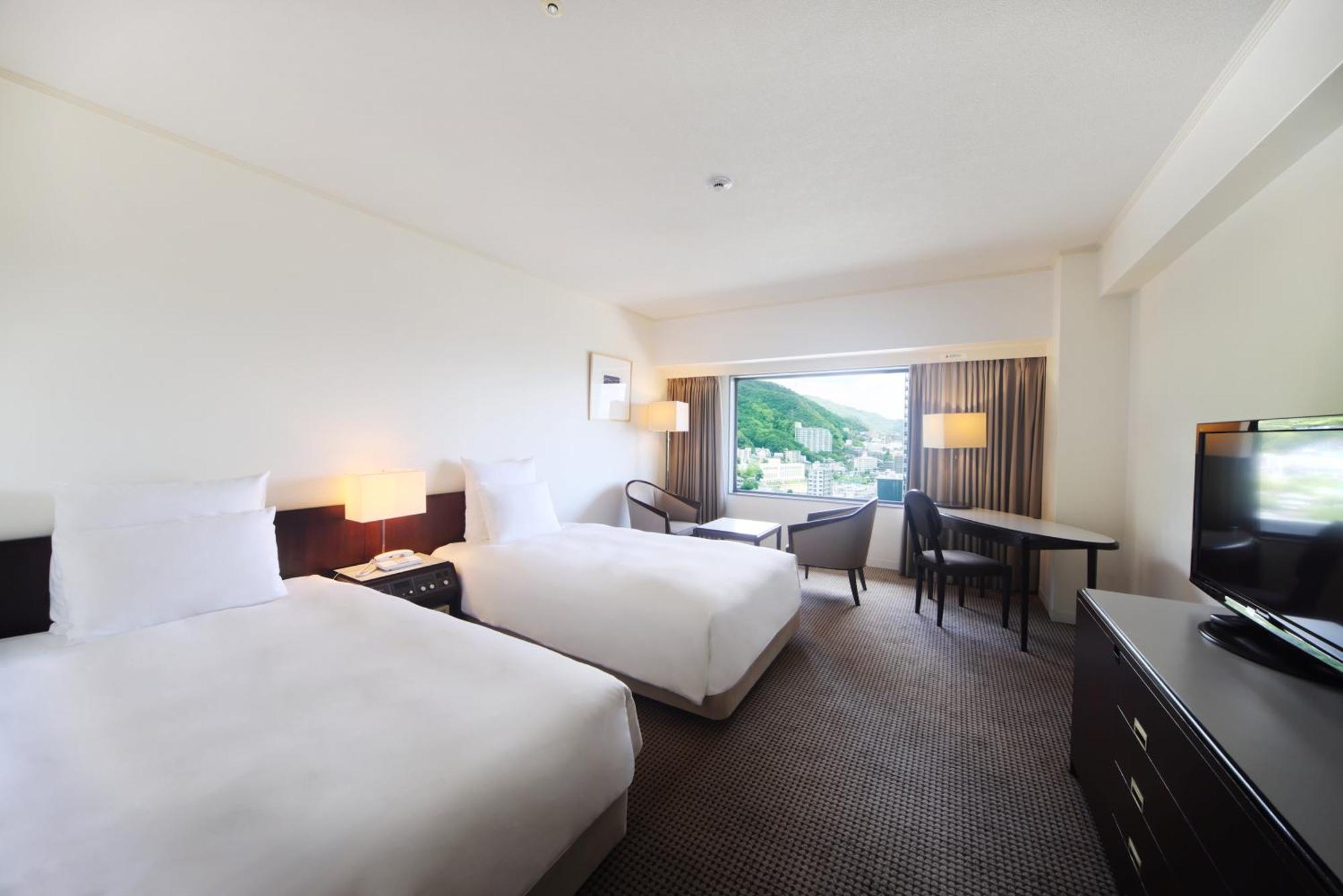 Ana Crowne Plaza Kobe By Ihg Exterior foto A room at the hotel